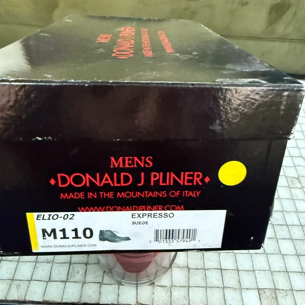 Donald J Pliner Italian crafted, pointed toe Chukka boots.